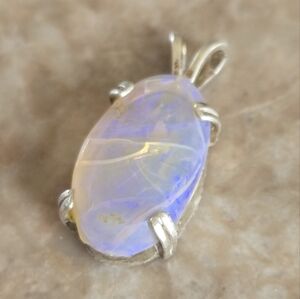 Elegant Black Opal Pendant